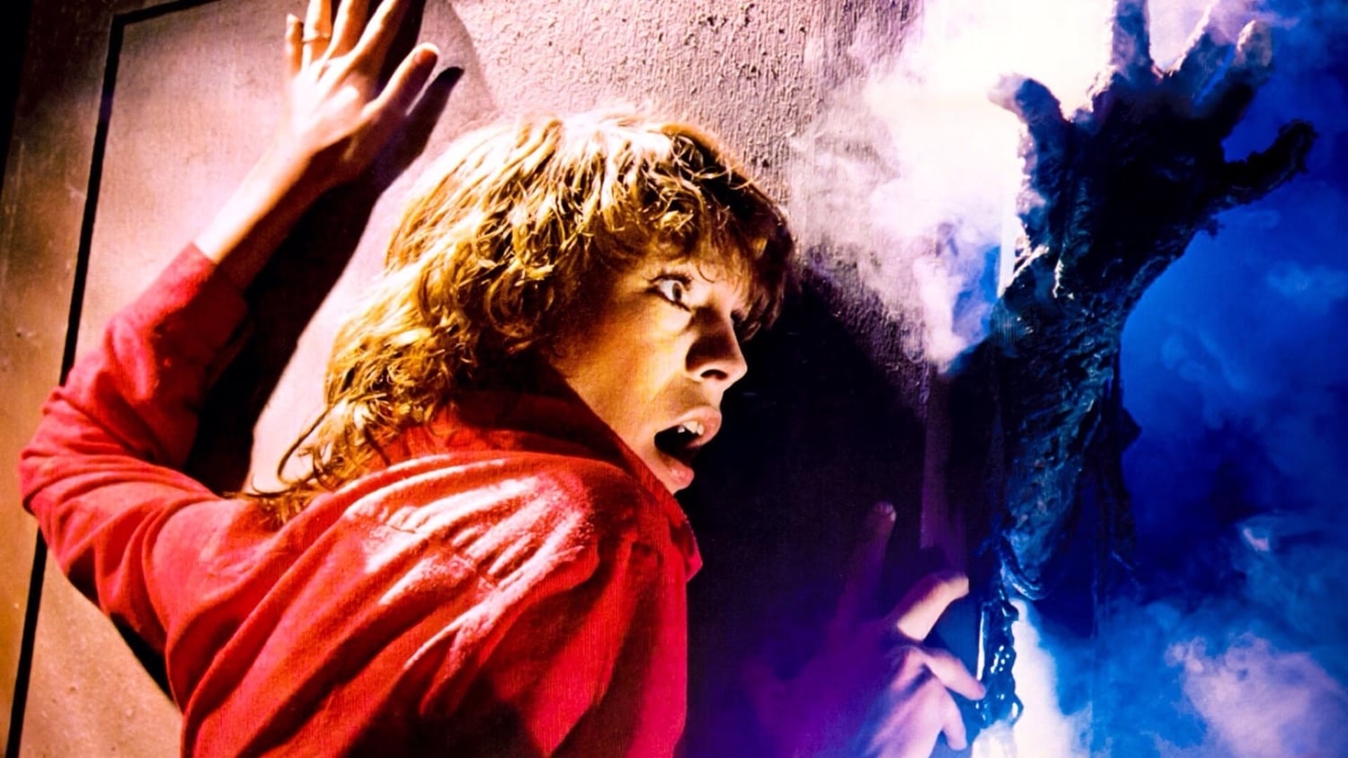 Adrienne Barbeau y una mano que sale de la niebla en La niebla, de John Carpenter